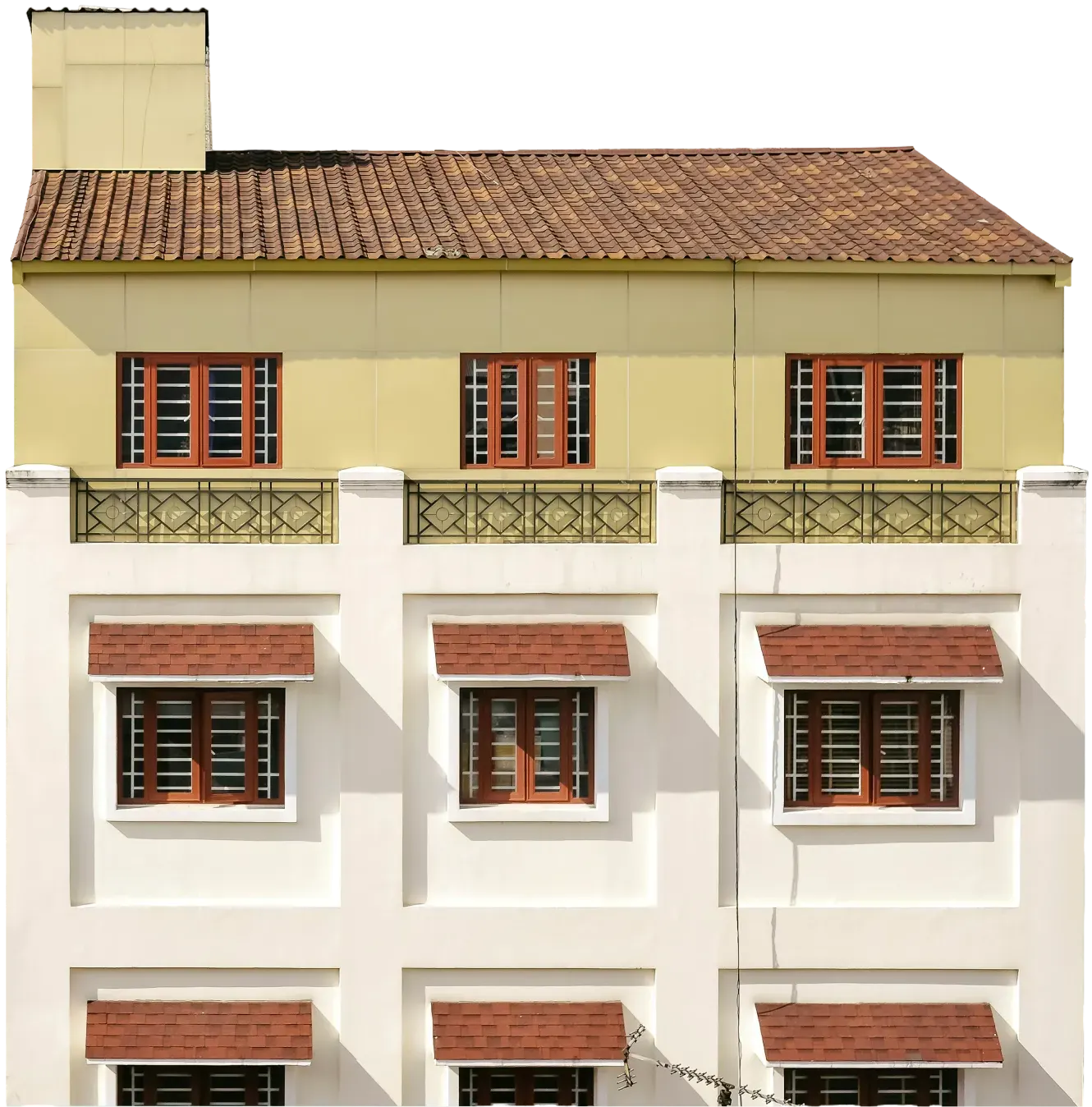 Multi-story home with a yellow and white facade and red-tiled window awnings.